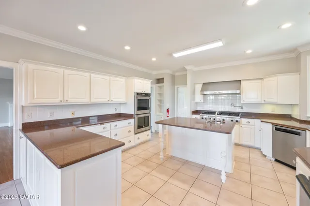 a view of a swimming pool with an outdoor seating