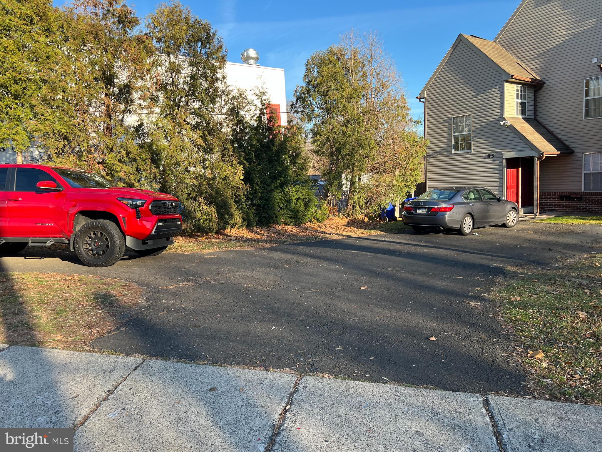 83 West Laurel Avenue Cheltenham, PA 19012 - Photo 2 of 19 a car parked in front of a house