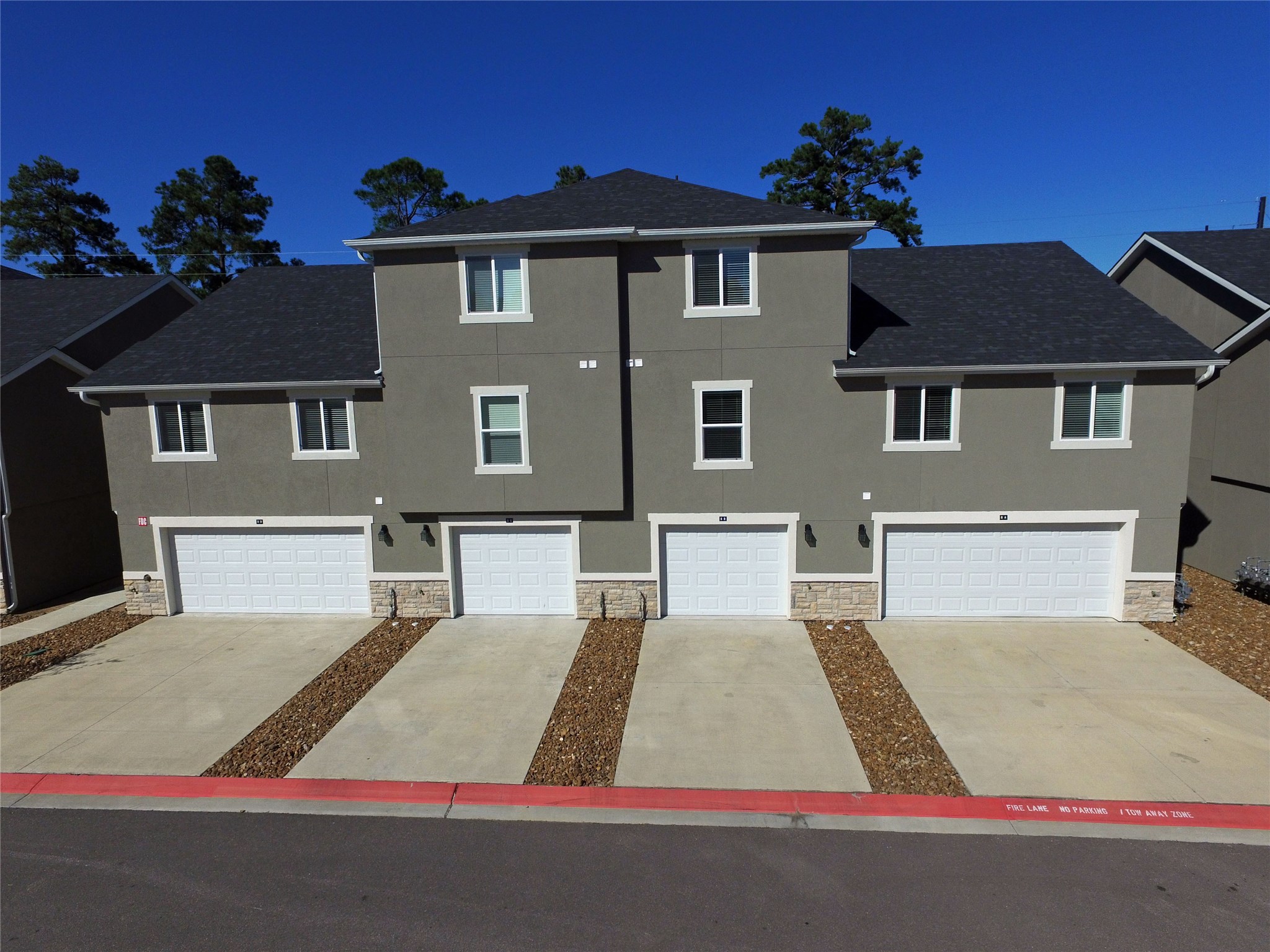 10535 Mills Road, Unit 4B Houston, TX 77070 - Photo 2 of 28 a view of house with yard
