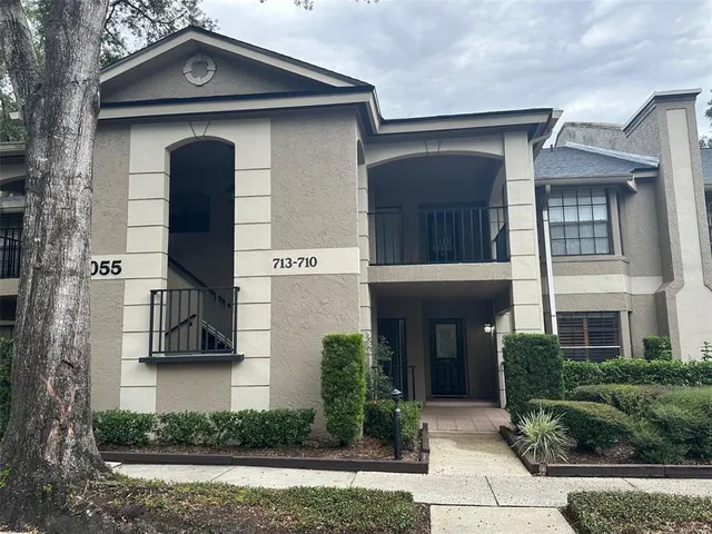a front view of a house with garage