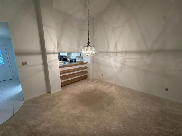 a view of a room with an empty space