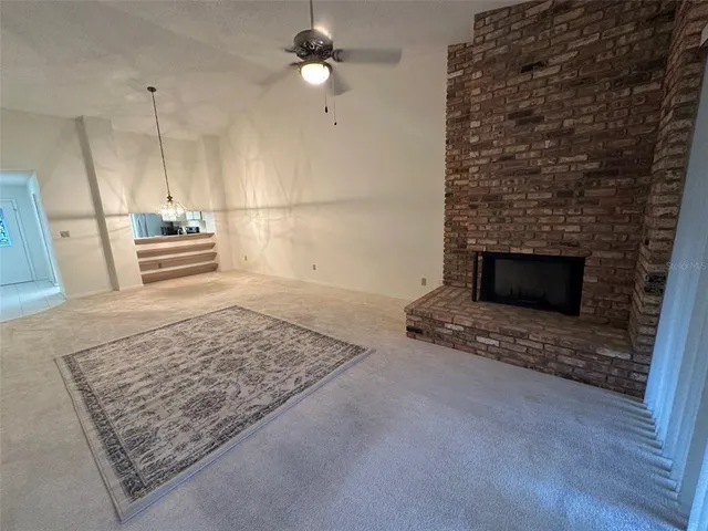 a living room with a fireplace