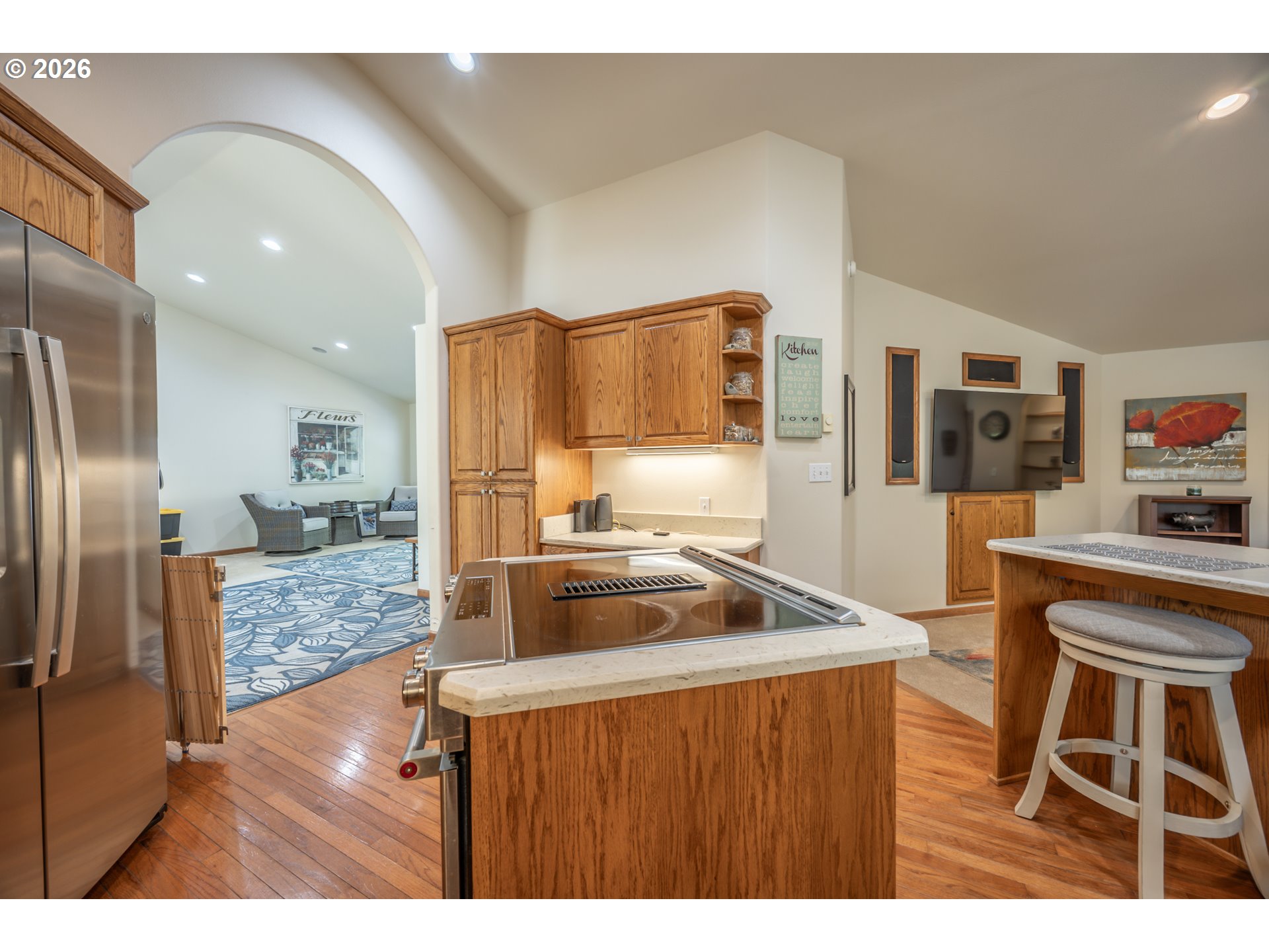 2193 13th Street Florence, OR 97439 - Photo 19 of 48 a kitchen with refrigerator and window