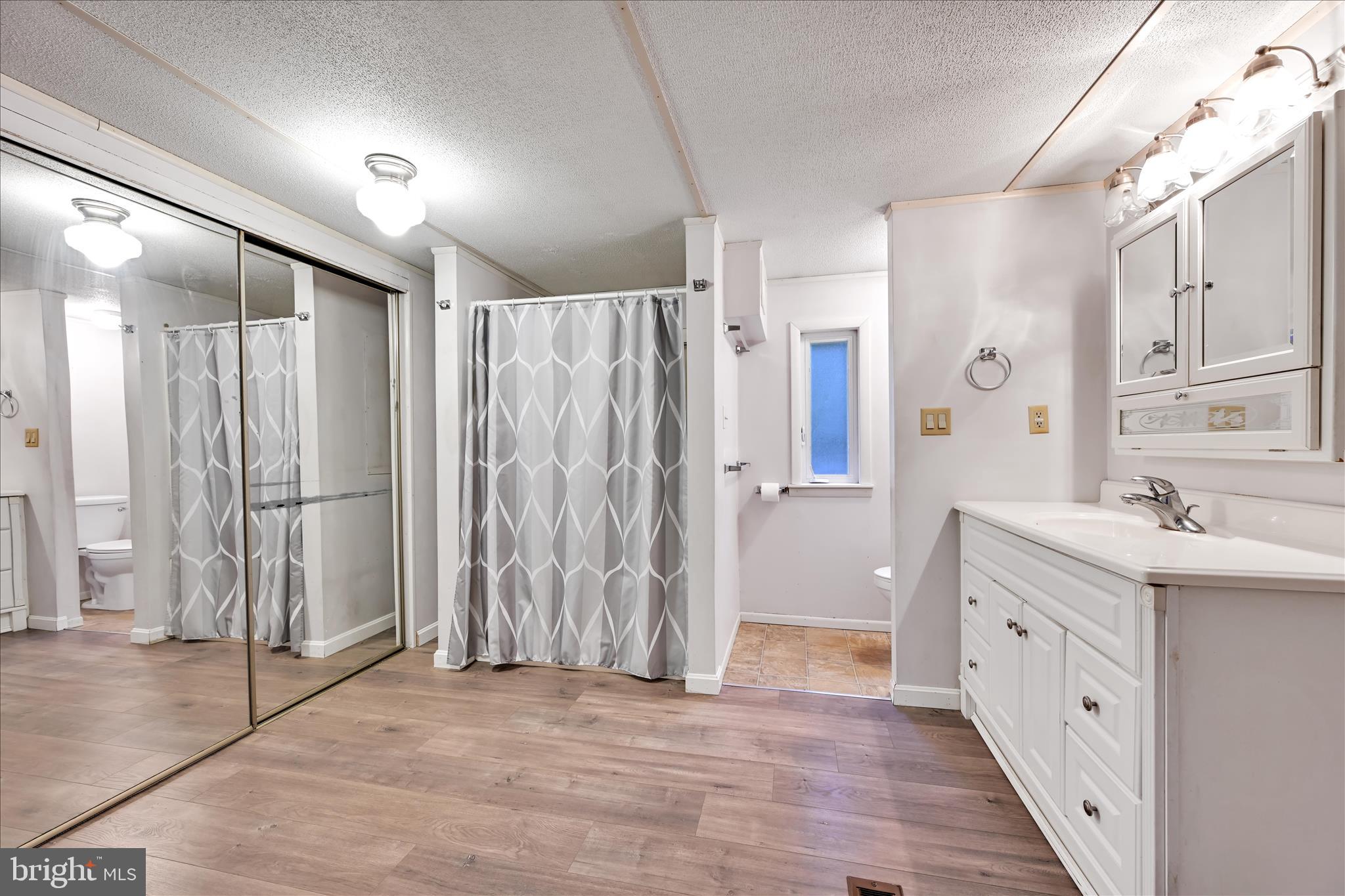 139 Sun Valley Road Elizabethtown, PA 17022 - Photo 20 of 32 a bathroom with a sink and a mirror