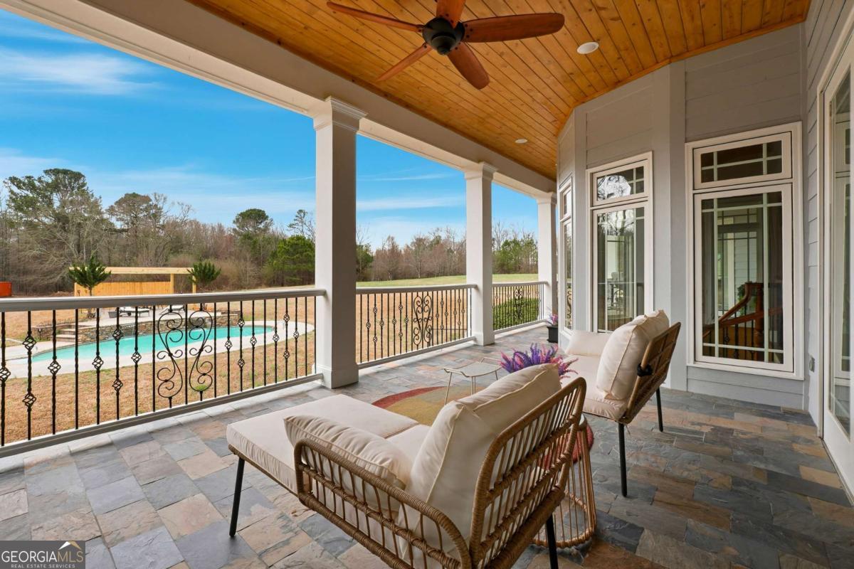 265 Honeysuckle Lane Temple, GA 30179 - Photo 12 of 46 a balcony with furniture and garden
