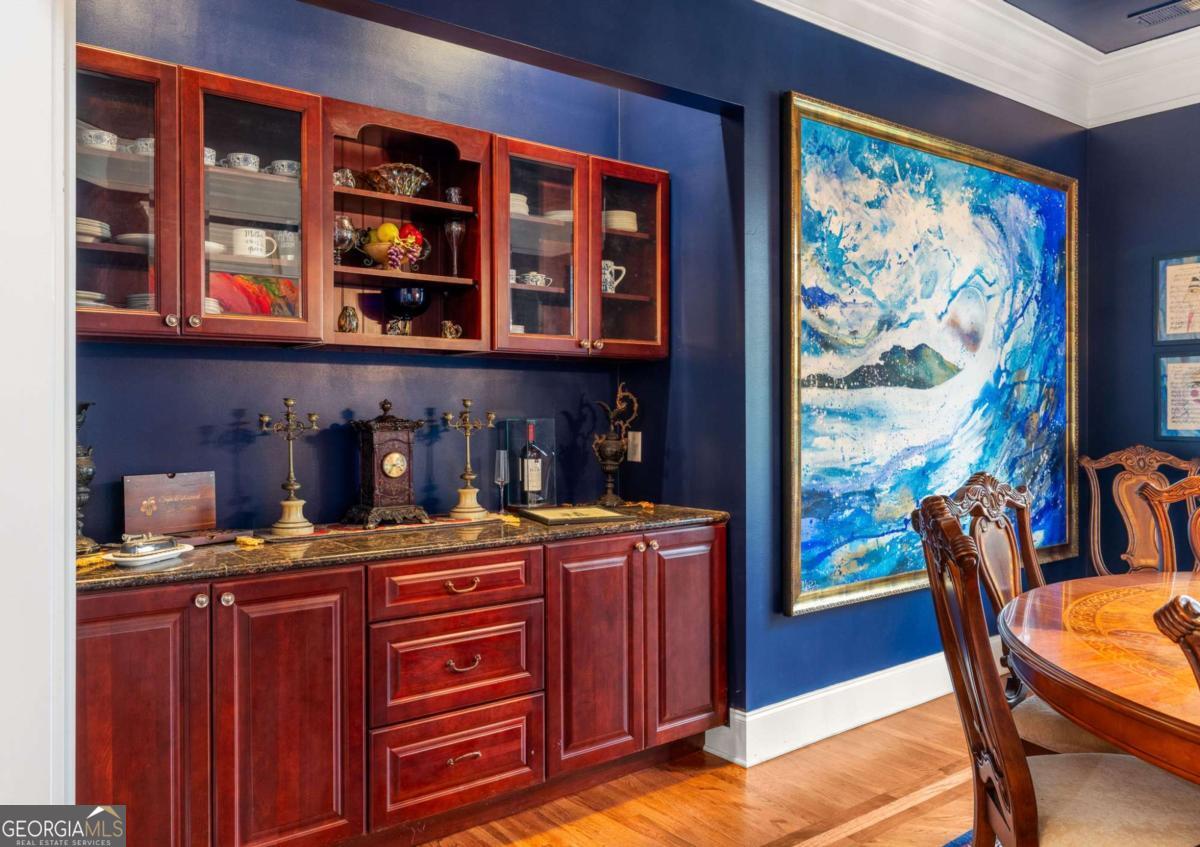 265 Honeysuckle Lane Temple, GA 30179 - Photo 16 of 46 a view of a dining room with furniture window and wooden floor