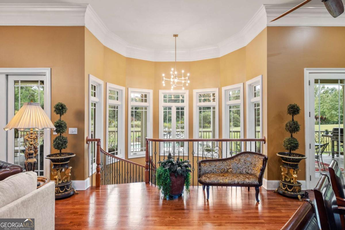 265 Honeysuckle Lane Temple, GA 30179 - Photo 2 of 46 a view of a livingroom with furniture window and wooden floor