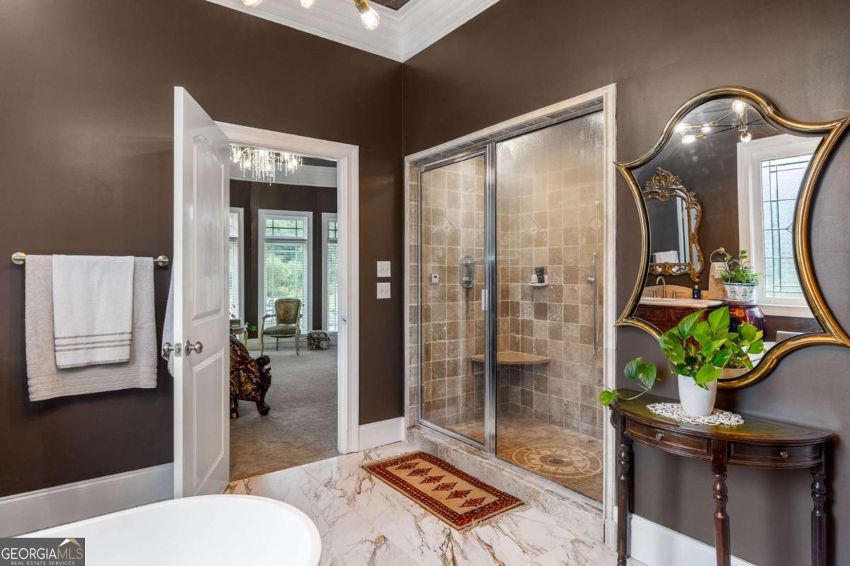 265 Honeysuckle Lane Temple, GA 30179 - Photo 21 of 46 a living room with furniture and a potted plant