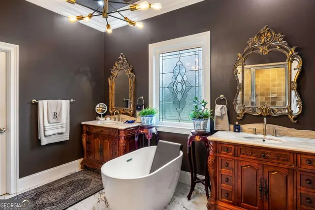 a bathroom with a double vanity sink a mirror and bathtub
