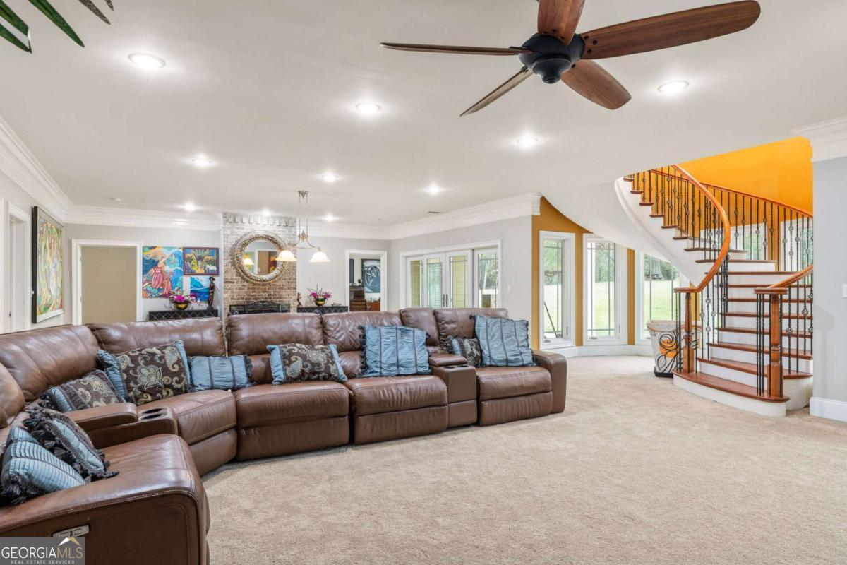 265 Honeysuckle Lane Temple, GA 30179 - Photo 28 of 46 a living room with furniture and a window