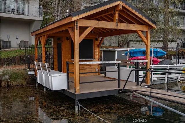 a view of a chairs and table in the patio