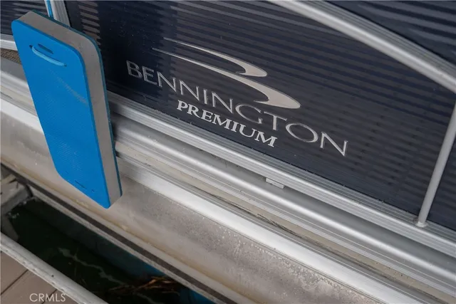 a swimming pool view with a outdoor seating