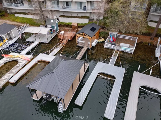 an aerial view of residential house with outdoor space and swimming pool