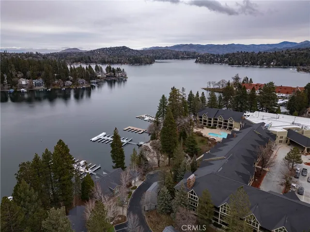 an aerial view of valley and lake