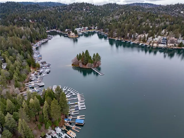an aerial view of multiple house with yard