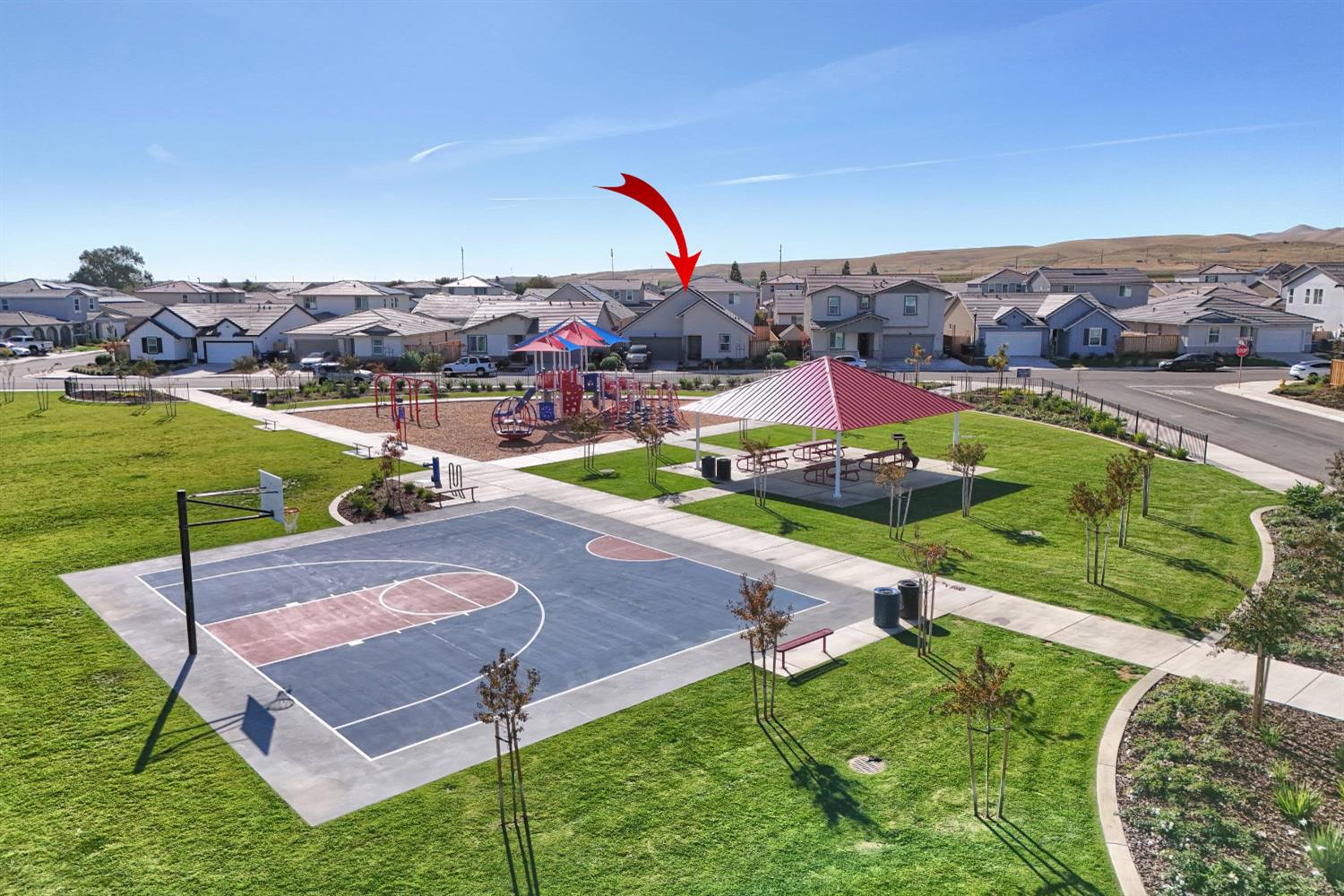 2132 Emerald Rnch Road Patterson, CA 95363 - Photo 60 of 66 an aerial view of a tennis ground and a cars park side of the road