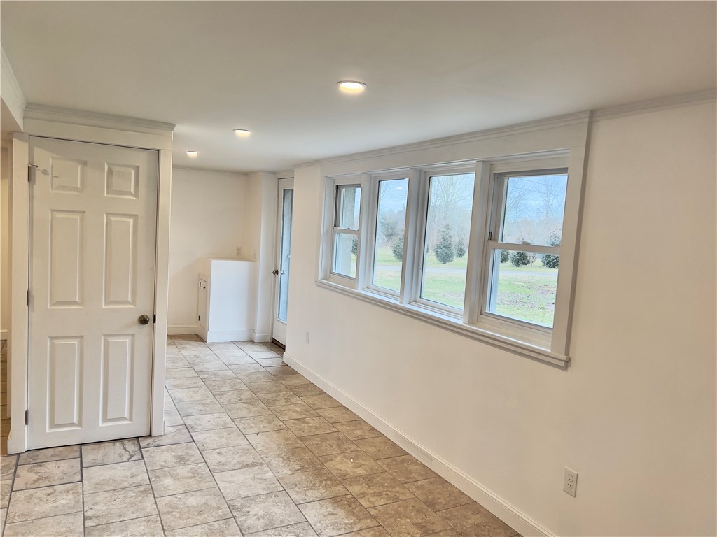 1802 Mooresfield Road South Kingstown, RI 02879 - Photo 18 of 34 Storage closet under stairs. Windows let in tons of light. These photos were taken on an overcast day.