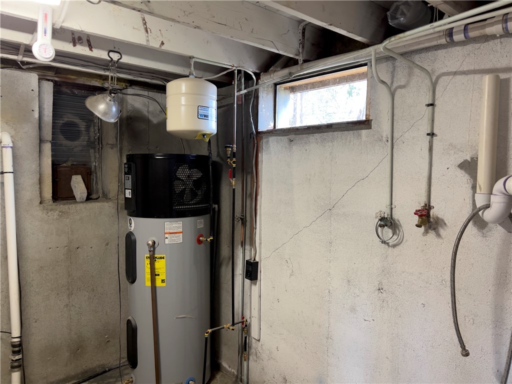 1802 Mooresfield Road South Kingstown, RI 02879 - Photo 21 of 34 Utility room. Old furnace chimney flue in backround.