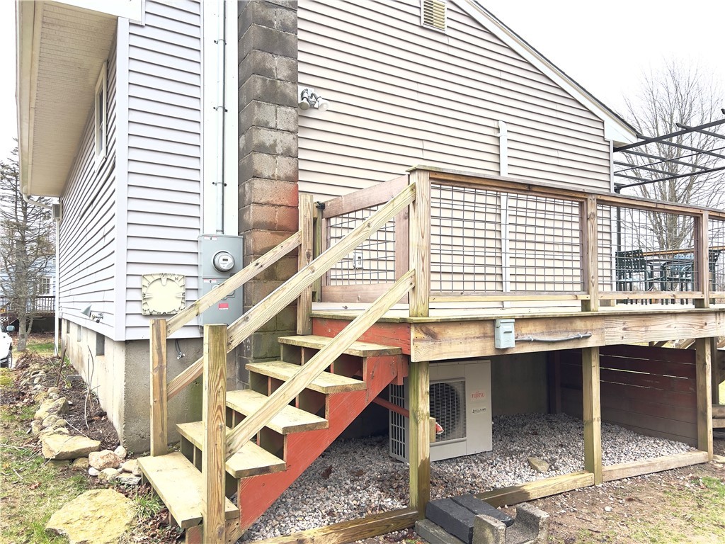 1802 Mooresfield Road South Kingstown, RI 02879 - Photo 25 of 34 Mini split under deck and sump pump discharge area.