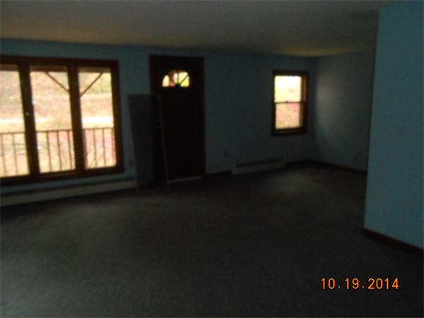 349 Erickson Road Ashby, MA 01431 - Photo 15 of 17 a view of empty room with window
