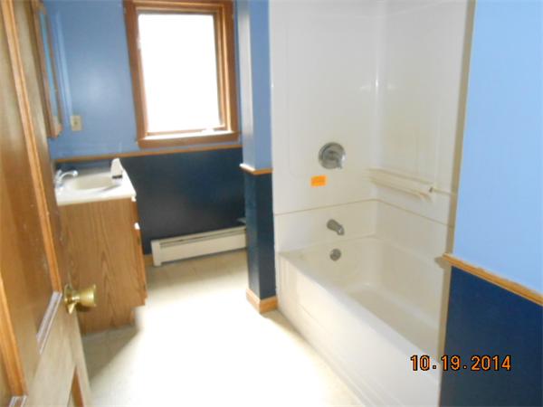 349 Erickson Road Ashby, MA 01431 - Photo 9 of 17 a bathroom with a tub a window and a shower