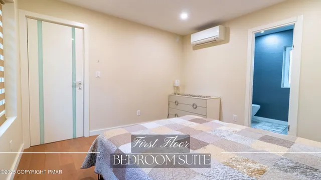 a bathroom with a toilet sink and vanity