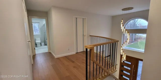 a view of an outdoor space and tennis court