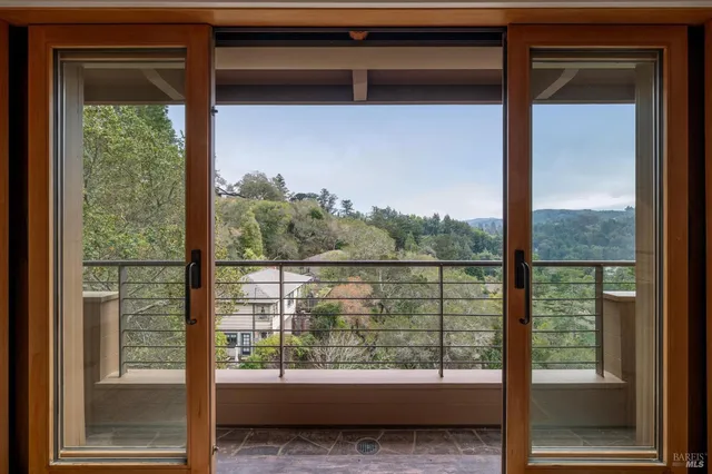 a view of a balcony with a lake view