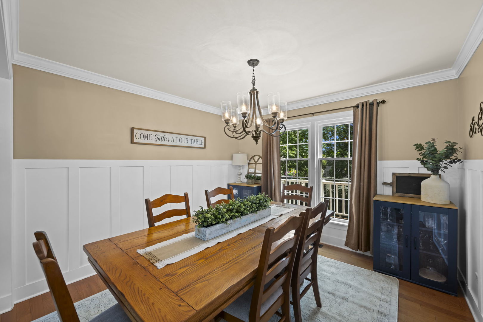 1565 Freeman Road Hoffman Estates, IL 60192 - Photo 17 of 46 a view of a dining room with furniture window and wooden floor
