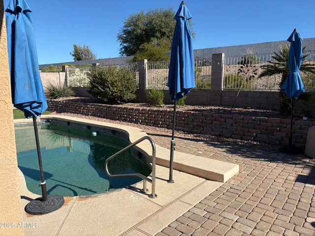 a view of backyard with outdoor space