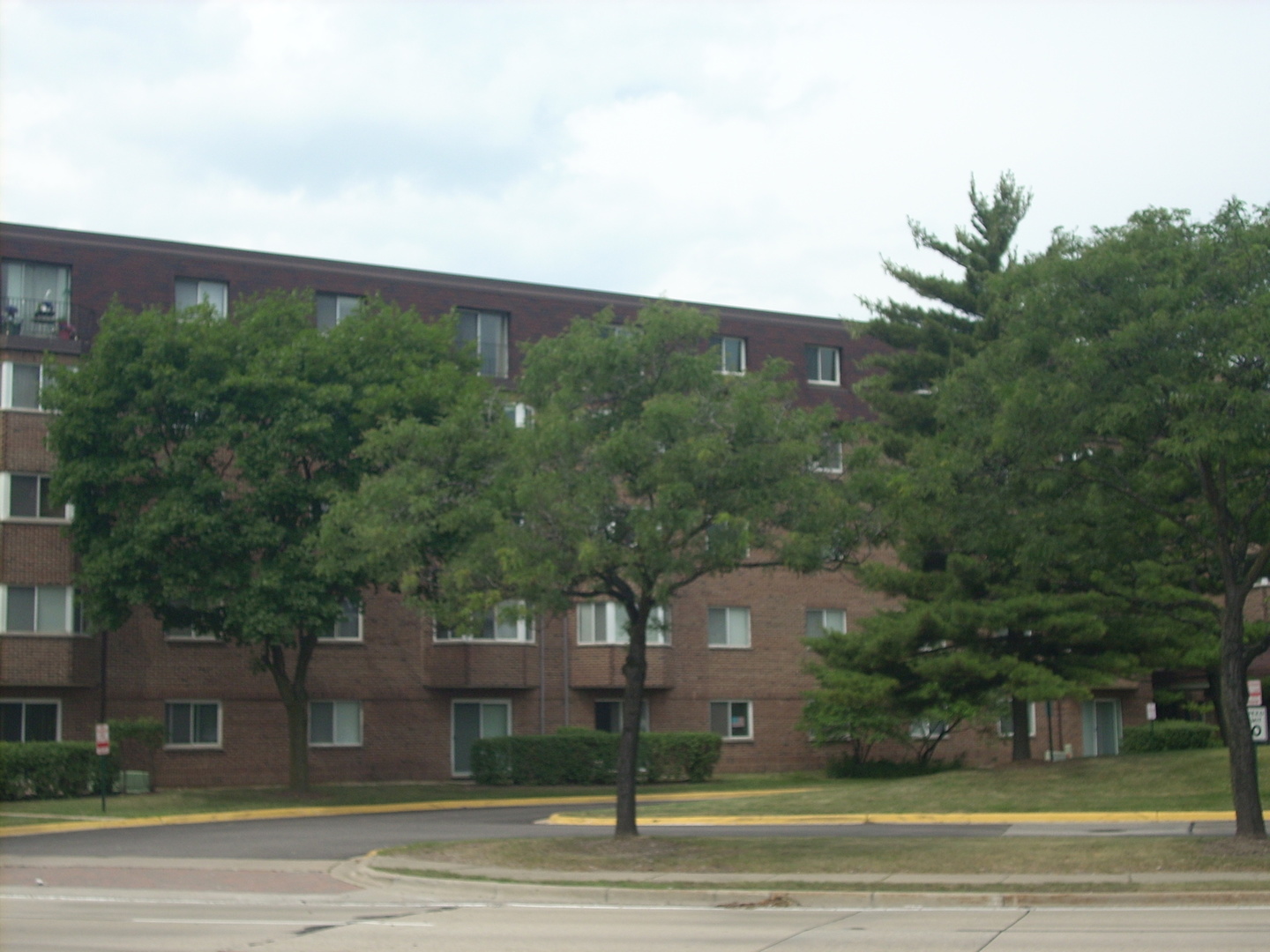 300 South Roselle Road, Unit 319 Schaumburg, IL 60193 - Photo 2 of 11 a view of a house with a yard