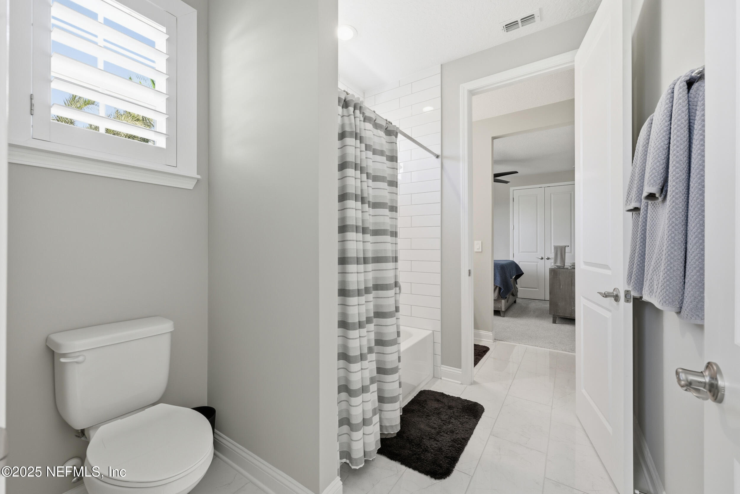 45 Rum Runner Way St. Johns, FL 32259 - Photo 24 of 50 a bathroom with a toilet and a shower