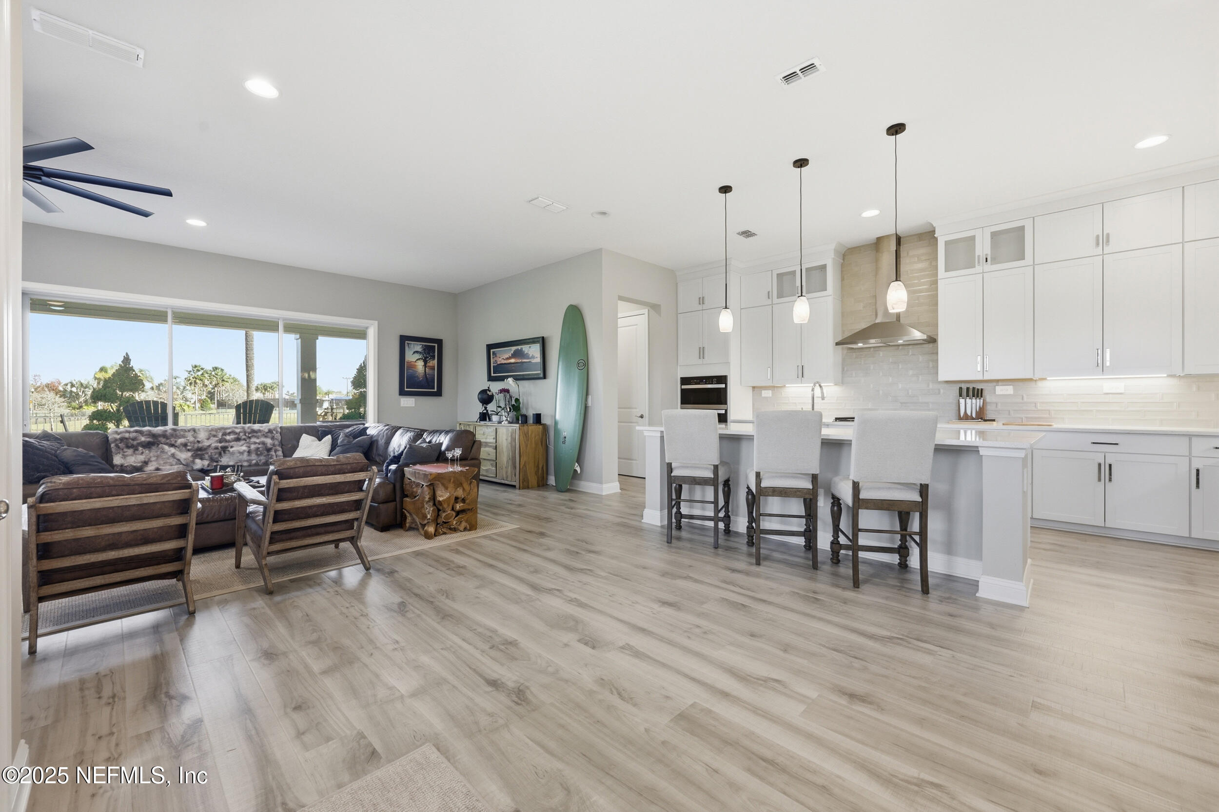 45 Rum Runner Way St. Johns, FL 32259 - Photo 6 of 50 a living room with lots of furniture and kitchen view