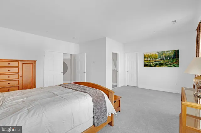 a view of a patio with a chairs and table in a patio