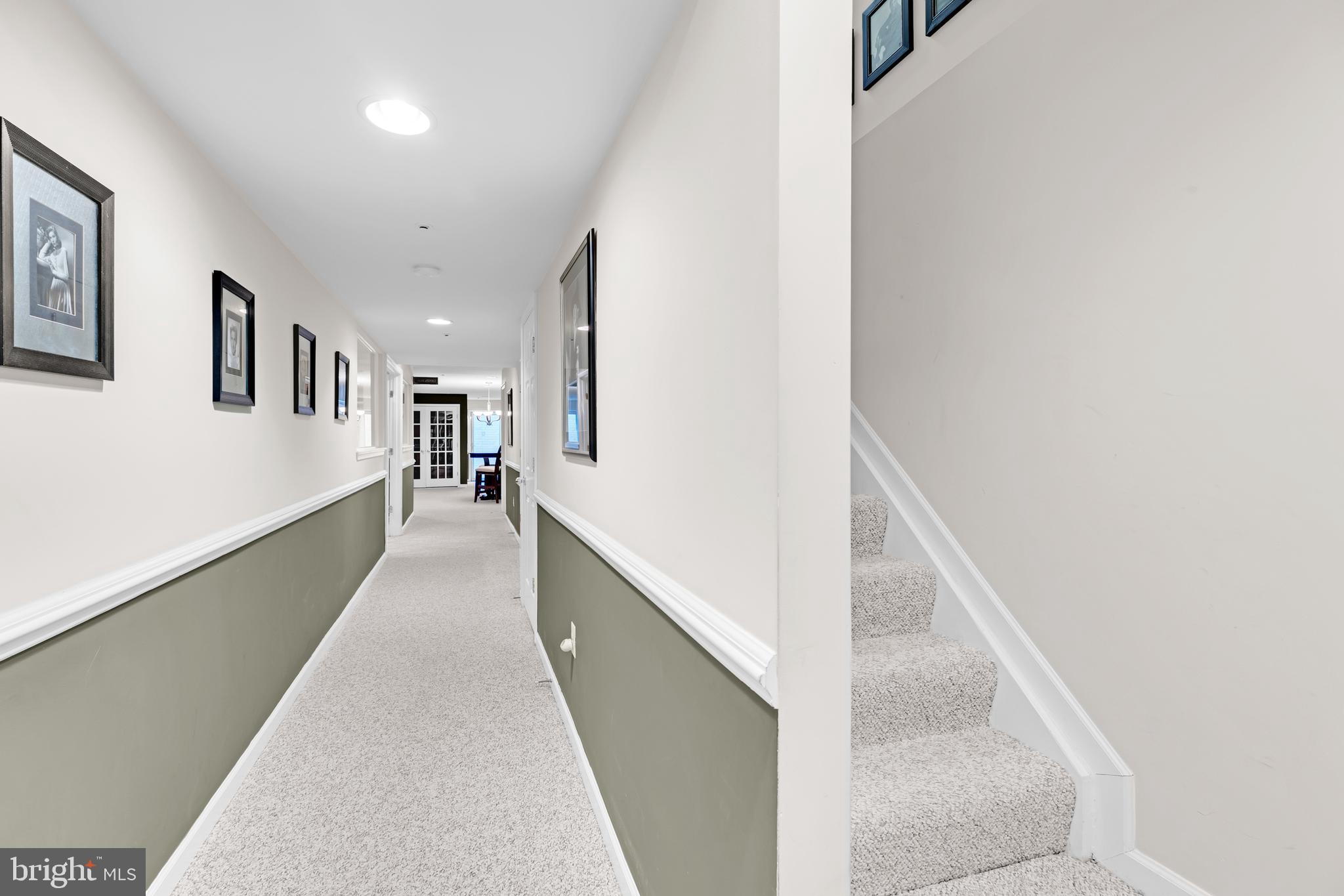 8781 Endless Ocean Way, Unit 58 Columbia, MD 21045 - Photo 49 of 74 a view of a hallway with windows