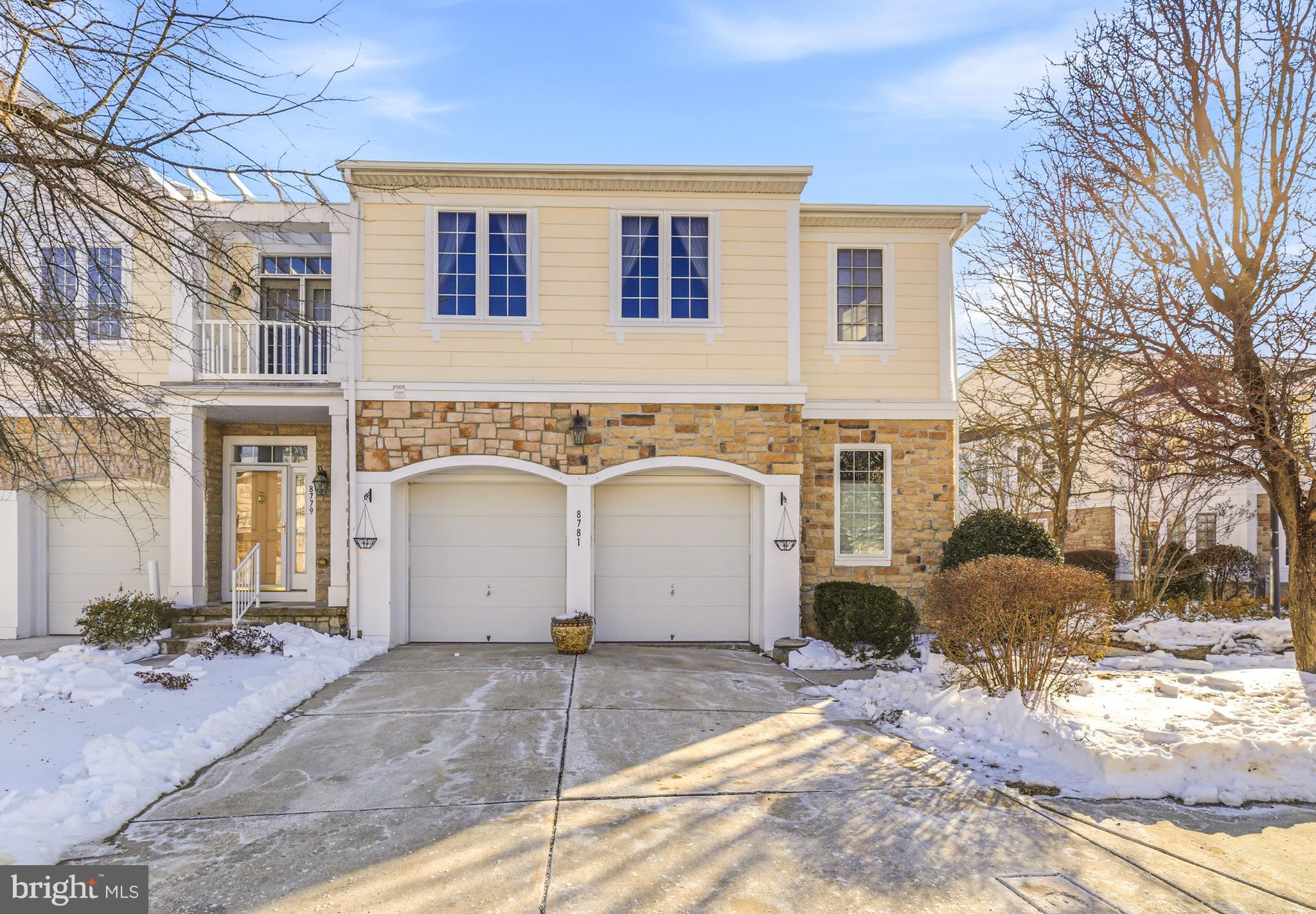 8781 Endless Ocean Way, Unit 58 Columbia, MD 21045 - Photo 6 of 74 a front view of a house with garden