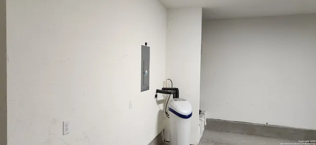 a view of a porch with wooden floor and roof