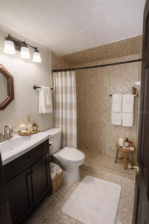 5020 Pine Street Seffner, FL 33584 - Photo 3 of 14 a bathroom with a sink toilet and shower