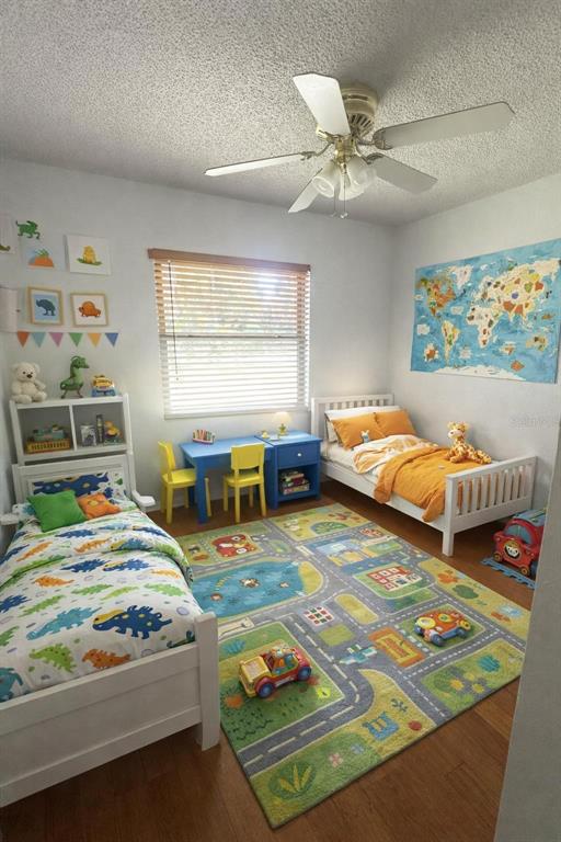 5020 Pine Street Seffner, FL 33584 - Photo 7 of 14 a bedroom with two beds and a window