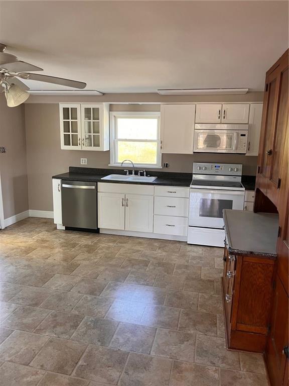 797 Carlton Drive Bentleyville, PA 15314 - Photo 23 of 24 a kitchen with stainless steel appliances granite countertop a stove and a sink
