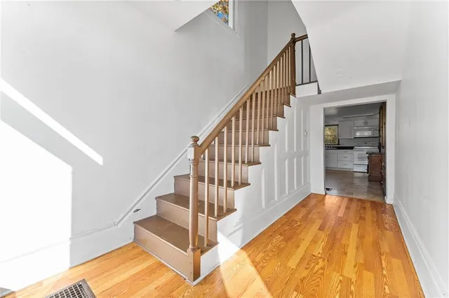 a view of a hallway with staircase