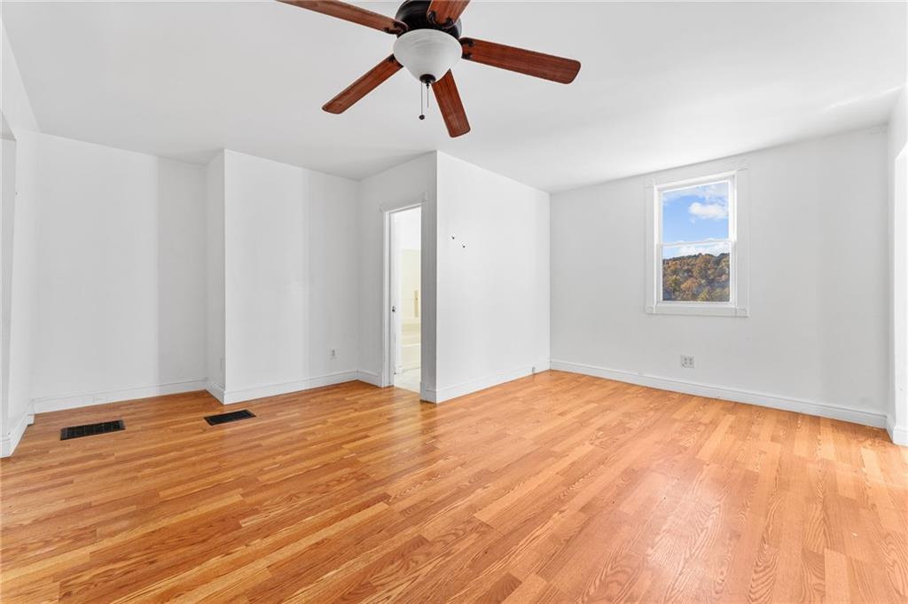 797 Carlton Drive Bentleyville, PA 15314 - Photo 9 of 24 a view of empty room with wooden floor
