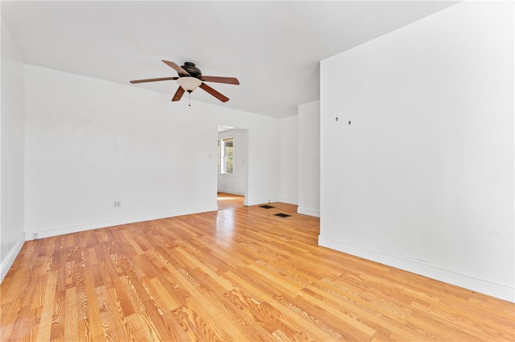 797 Carlton Drive Bentleyville, PA 15314 - Photo 10 of 24 a view of a big room with wooden floor and cabinet