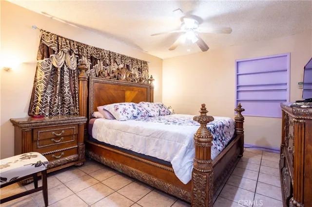 a bedroom with a bed and a walk in closet