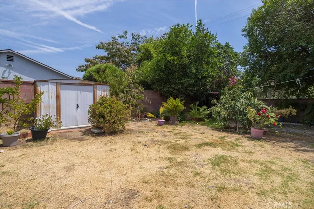 a room with furniture and a wooden floor