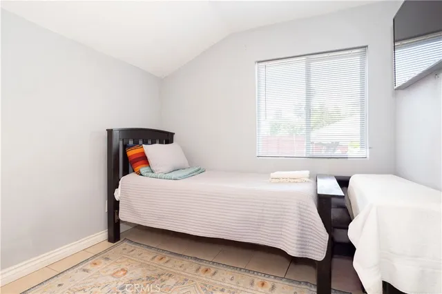 an aerial view of a house with outdoor space