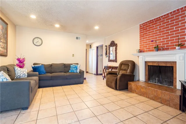 a kitchen with stainless steel appliances granite countertop a sink and a stove