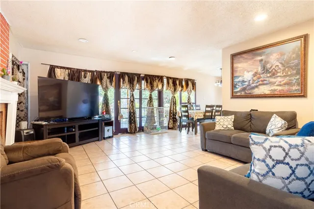 a kitchen with granite countertop a sink and a stove