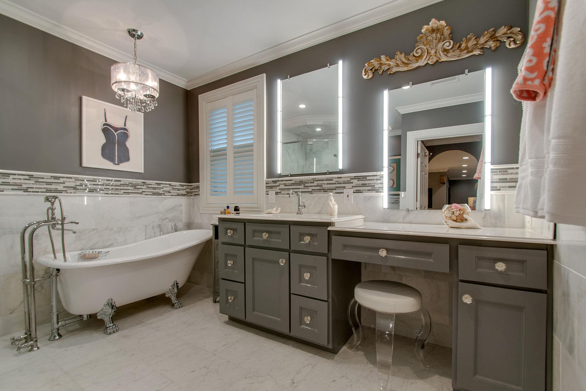 731 General George Patton Road Nashville, TN 37221 - Photo 11 of 19 a spacious bathroom with a granite countertop sink mirror and a bathtub