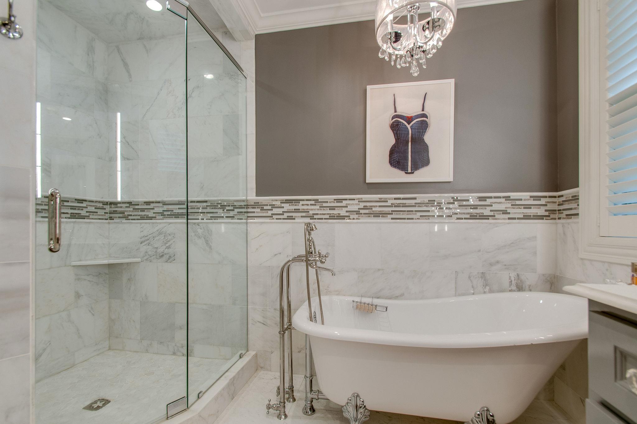 731 General George Patton Road Nashville, TN 37221 - Photo 12 of 19 a bathroom with a bathtub and a shower